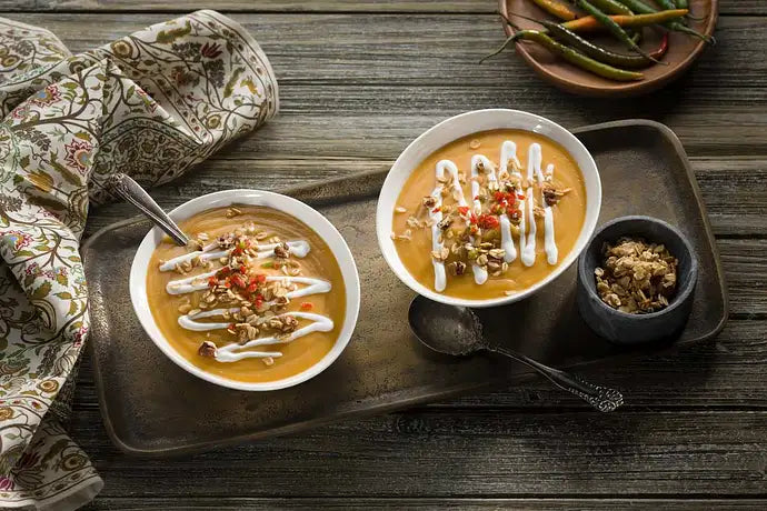 Roasted Acorn Squash and Sweet Potato Soup with Pumpkin Pecan Crunch